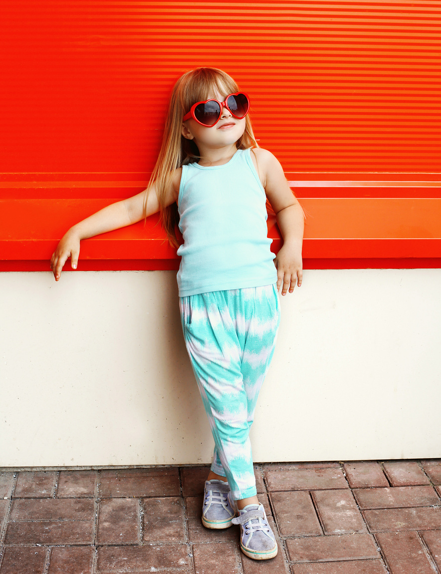 Fashion kid concept - stylish little girl child